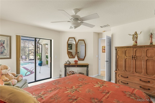 bedroom featuring visible vents, ceiling fan, baseboards, a textured ceiling, and access to outside