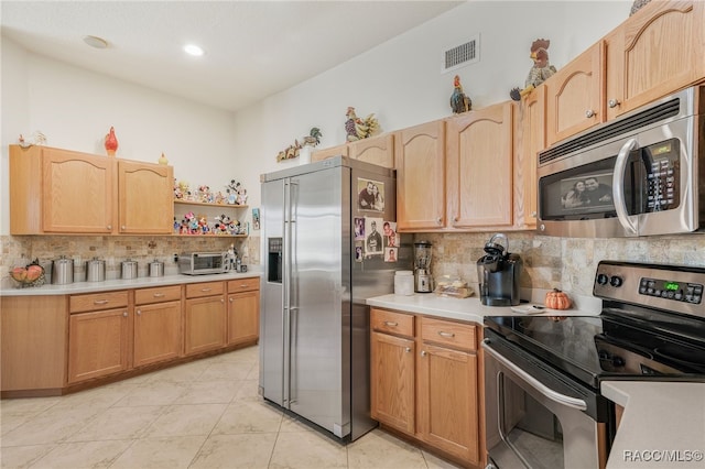 kitchen with visible vents, open shelves, stainless steel appliances, decorative backsplash, and light countertops