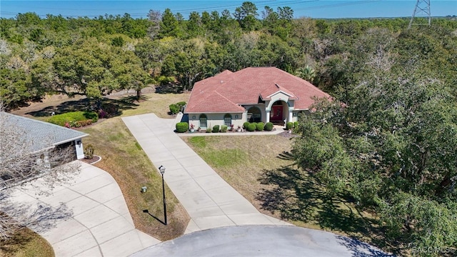 aerial view with a wooded view