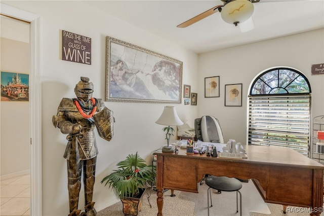 office area with light tile patterned floors and a ceiling fan