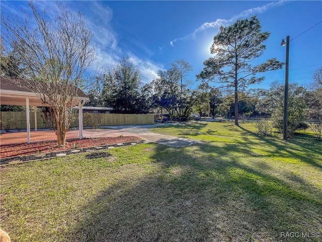 view of yard with fence