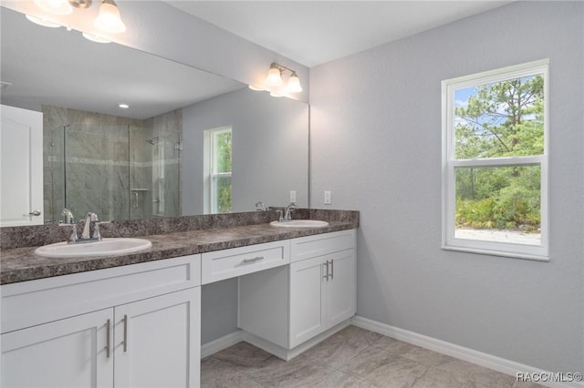 bathroom with vanity and walk in shower