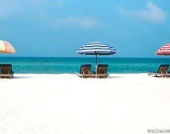 property view of water featuring a beach view