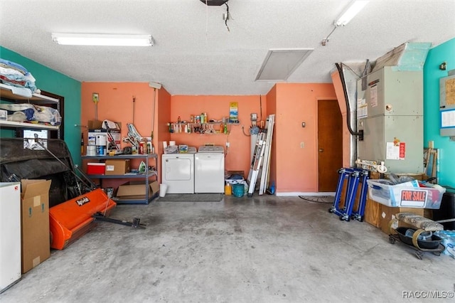 garage with washer and dryer