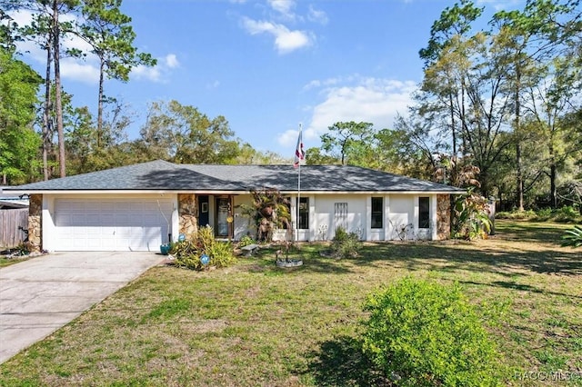 ranch-style house with stucco siding, concrete driveway, a front lawn, a garage, and stone siding