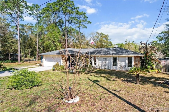 ranch-style home featuring stucco siding, a front lawn, driveway, fence, and a garage