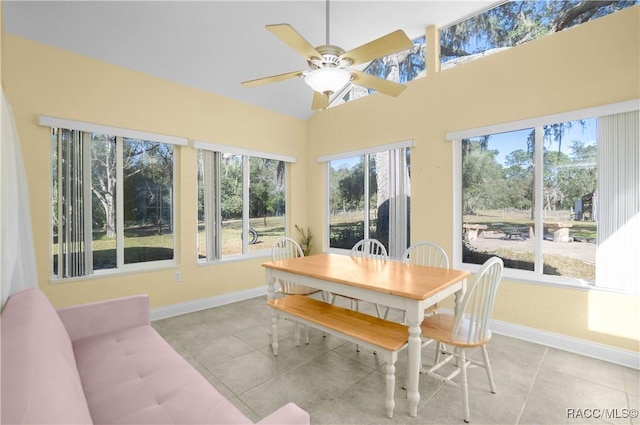 sunroom with vaulted ceiling and ceiling fan