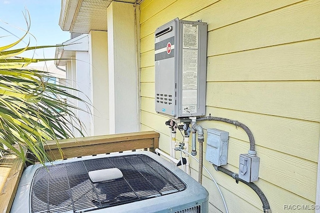 11938 W Blue Bayou Ct Unit 331, Crystal River, FL 34429 - exterior details featuring central AC and water heater