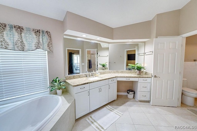 11938 W Blue Bayou Ct Unit 331, Crystal River, FL 34429 - bathroom featuring tile patterned floors, toilet, a bath, vanity, and a shower
