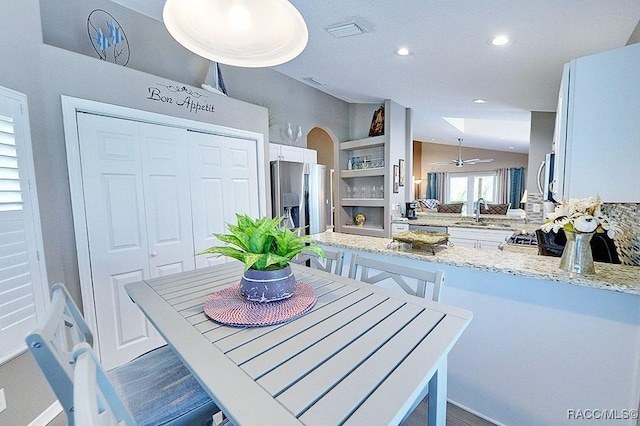 11938 W Blue Bayou Ct Unit 331, Crystal River, FL 34429 - dining space with visible vents, wood finished floors, lofted ceiling, and recessed lighting