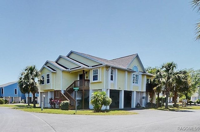 11938 W Blue Bayou Ct Unit 331, Crystal River, FL 34429 - view of front facade featuring driveway and stairway