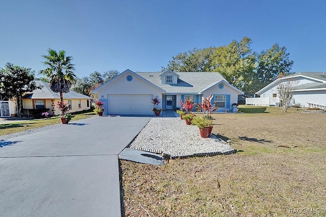 view of front facade featuring a garage and a front lawn