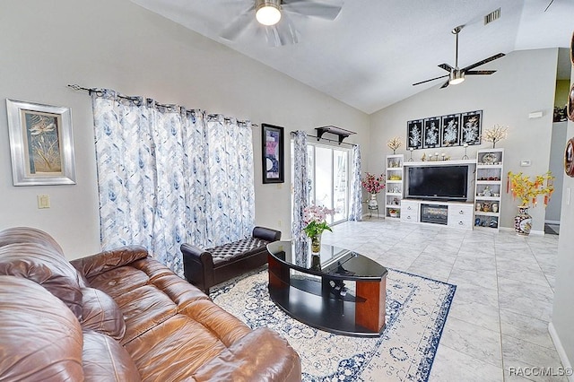 living room featuring vaulted ceiling and ceiling fan