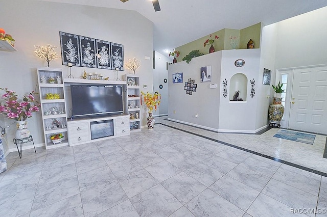 living room featuring high vaulted ceiling and ceiling fan