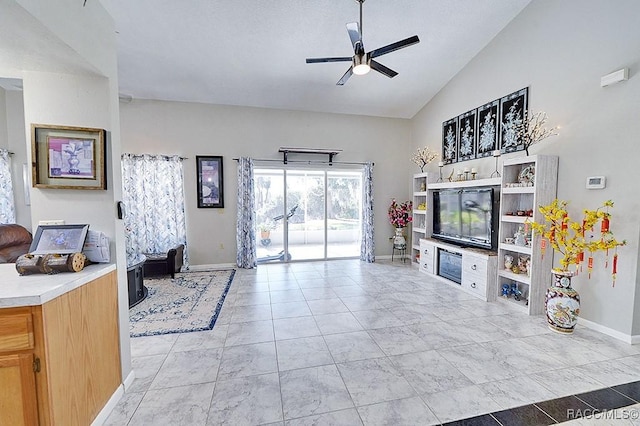 living room featuring high vaulted ceiling and ceiling fan