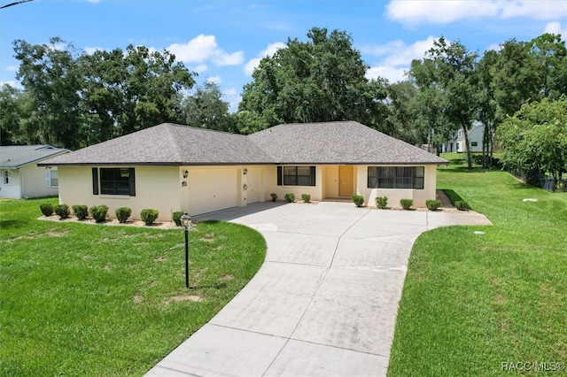 single story home with a garage and a front yard