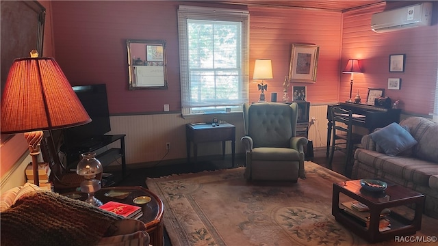 living room with wood walls, a wall mounted air conditioner, and hardwood / wood-style flooring