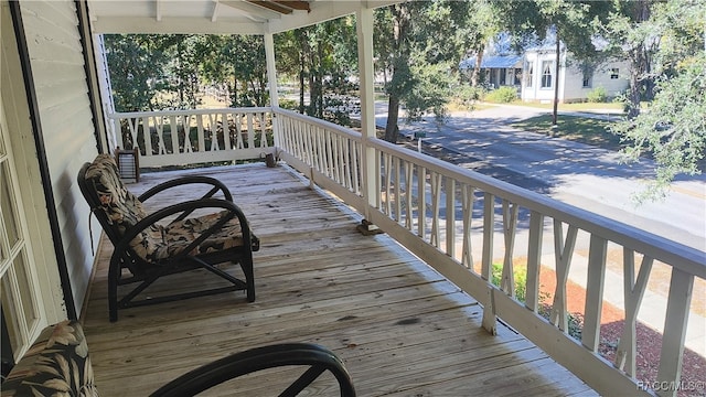 wooden terrace with covered porch