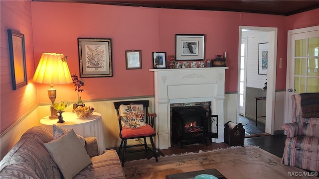 interior space with a premium fireplace and hardwood / wood-style floors