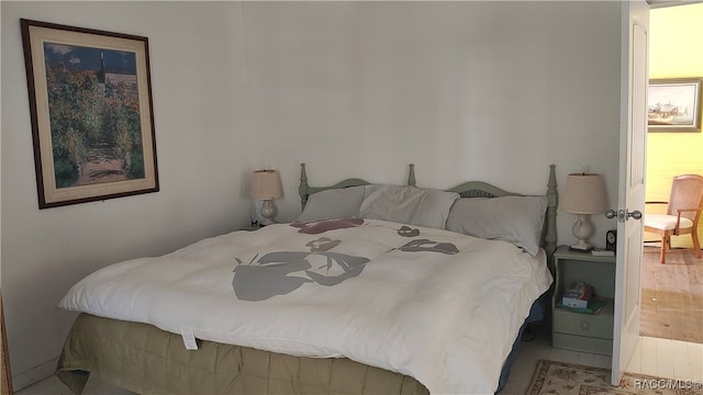 bedroom featuring hardwood / wood-style floors