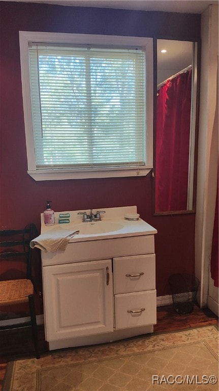 bathroom featuring sink and a shower with shower curtain