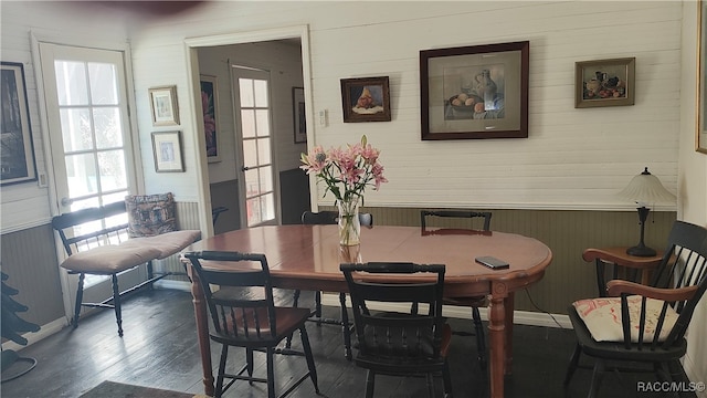 dining room featuring dark hardwood / wood-style flooring