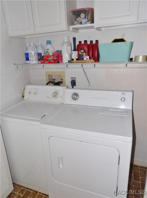 3966 N Spanish Moss Pt, Beverly Hills, FL 34465 - washroom featuring cabinet space and washing machine and dryer