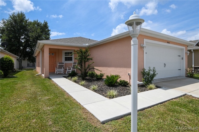 view of front facade featuring a front lawn and a garage