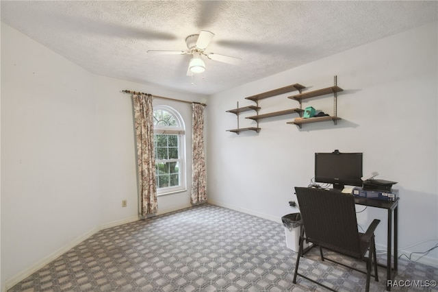 office area featuring a textured ceiling and ceiling fan