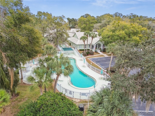 view of swimming pool with a patio area