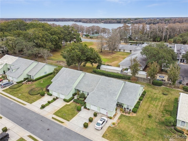 birds eye view of property featuring a water view