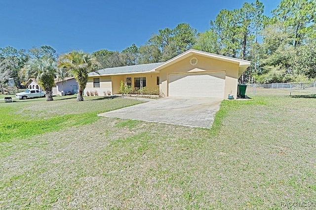 ranch-style home with stucco siding, concrete driveway, an attached garage, a front yard, and fence