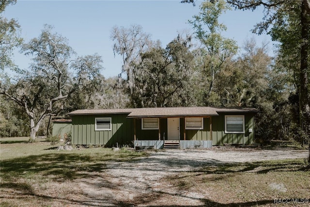 view of front of property featuring board and batten siding and entry steps