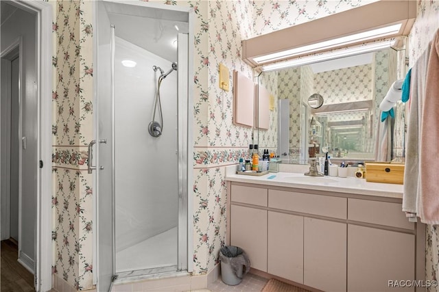 9530 SW 189th Ct, Dunnellon, FL 34432 - bathroom featuring wallpapered walls, a stall shower, and vanity