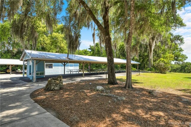 9530 SW 189th Ct, Dunnellon, FL 34432 - view of community featuring a lawn