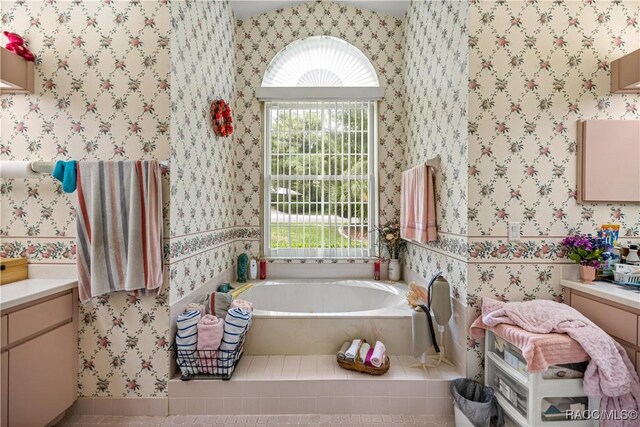 9530 SW 189th Ct, Dunnellon, FL 34432 - bathroom with a garden tub, wallpapered walls, and vanity