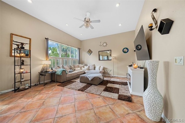 tiled living room featuring ceiling fan