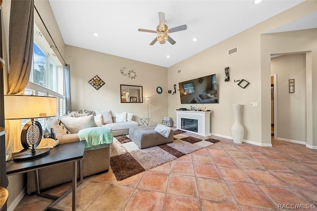 living room featuring ceiling fan and light tile patterned floors