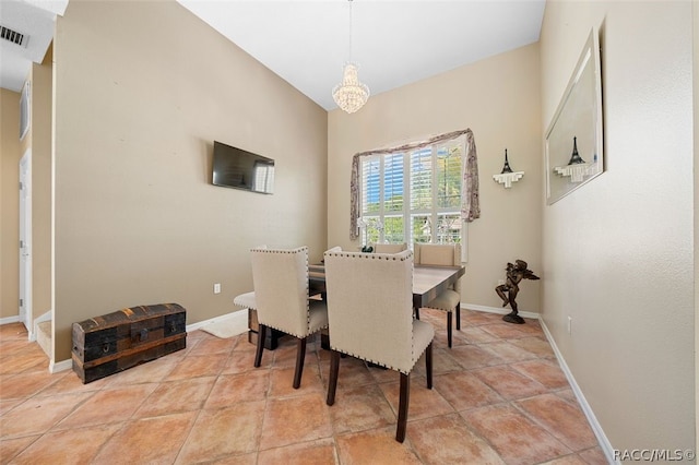 dining room featuring a chandelier