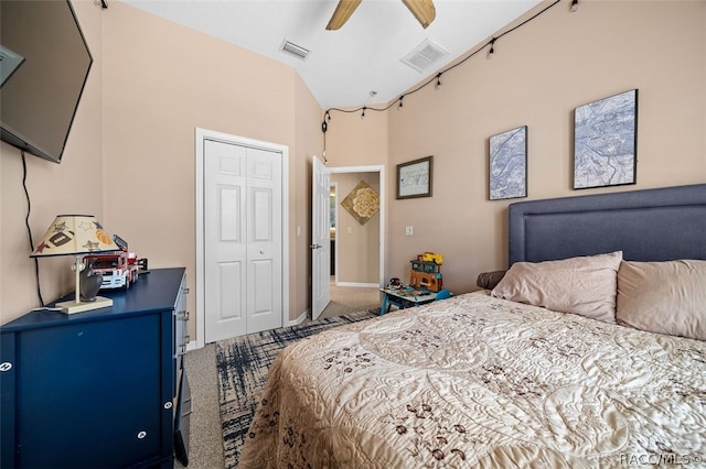 carpeted bedroom featuring a closet and ceiling fan