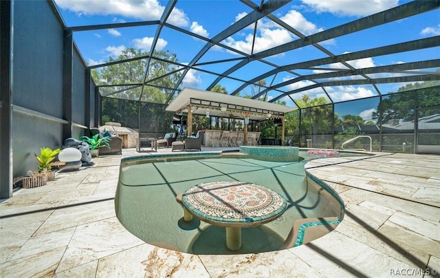 view of swimming pool featuring a lanai, a patio area, and an outdoor bar