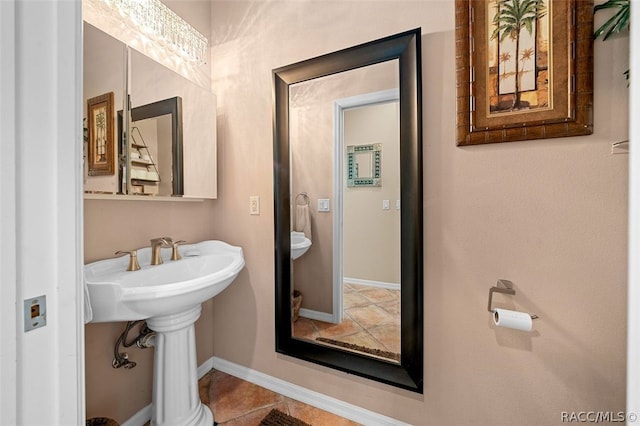 bathroom with tile patterned floors and sink