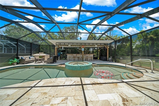 view of swimming pool with a lanai, a patio area, an outdoor bar, and an outdoor hangout area