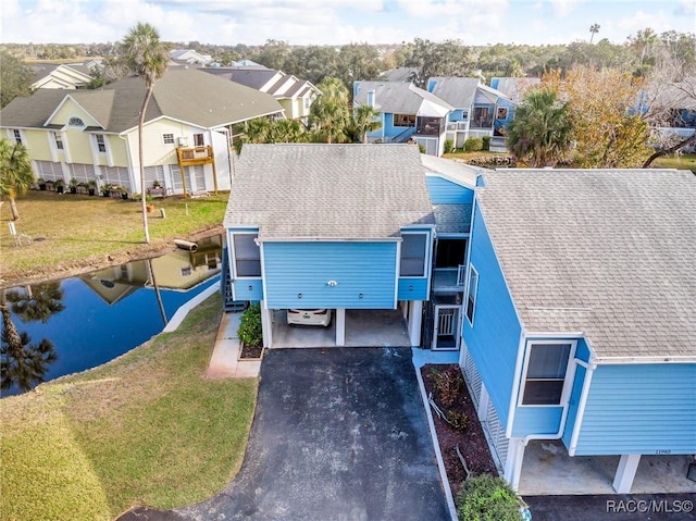 bird's eye view with a water view