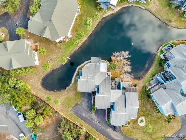 drone / aerial view with a water view