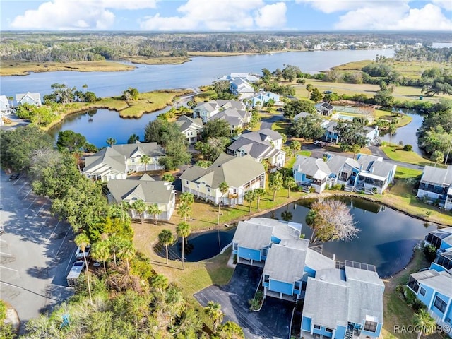 bird's eye view with a water view