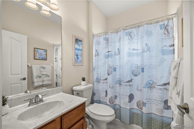 bathroom featuring tile patterned floors, vanity, toilet, and a shower with curtain