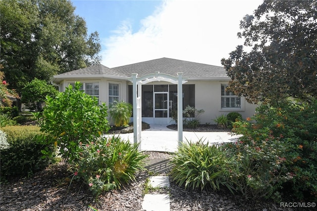 rear view of house with a patio area