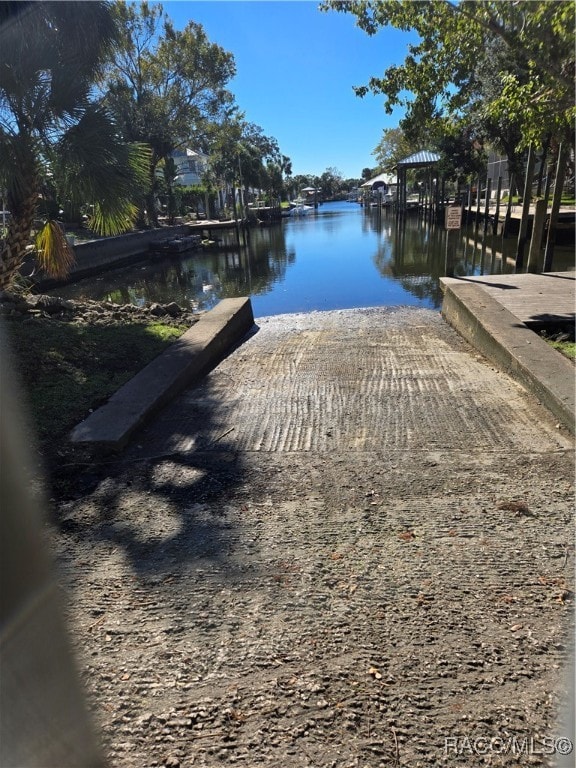 view of dock with a water view