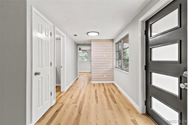 corridor featuring light wood-type flooring